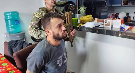 Conheça a identidade de R7,brasileiro detido sob suspeita de ser o principal traficante de armas associado ao PCC Conheça a identidade de R7, brasileiro detido sob suspeita de ser o principal traficante de armas associado ao PCC
